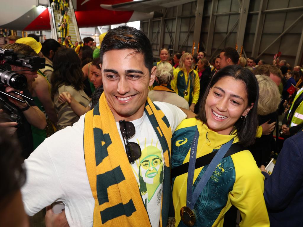 Saya Sakakibara with brother Kai after returning home as a gold medal winner. Picture: Rohan Kelly