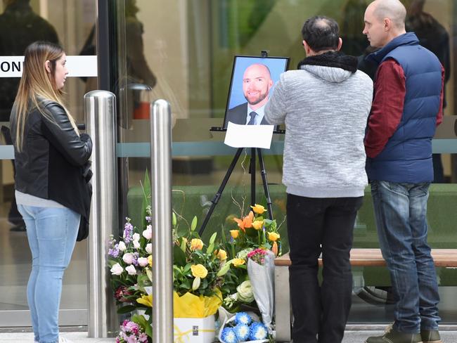 People pay their respects to Mr Pritzwald-Stegmann outside Box Hill Hospital. Picture: Nicole Garmston