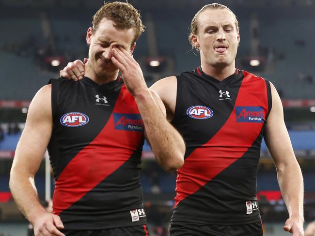 MELBOURNE, AUSTRALIA - JULY 01: Darcy Parish (L) and Mason Redman of the Bombers look dejected as they leave the field after the round 16 AFL match between Essendon Bombers and Port Adelaide Power at Melbourne Cricket Ground, on July 01, 2023, in Melbourne, Australia. (Photo by Daniel Pockett/Getty Images)