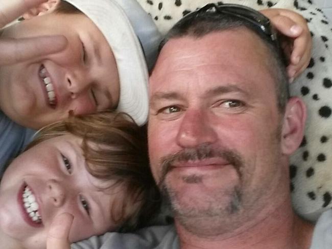 Paul Marney, 44, with kids Caleb, 12, and Amy, 8, before his accident.