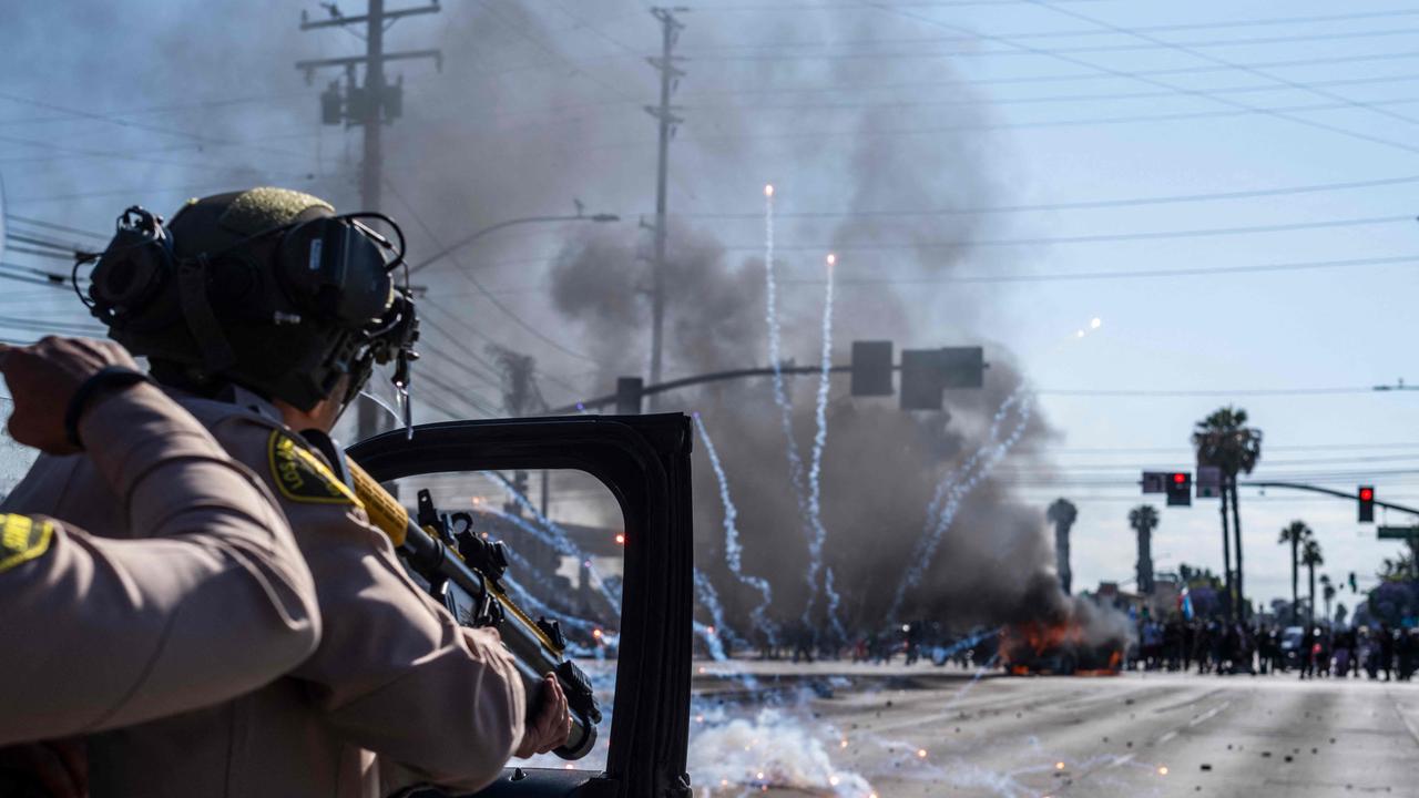 2000 TROOPS CALLED IN: Riot chaos rocks two major US cities