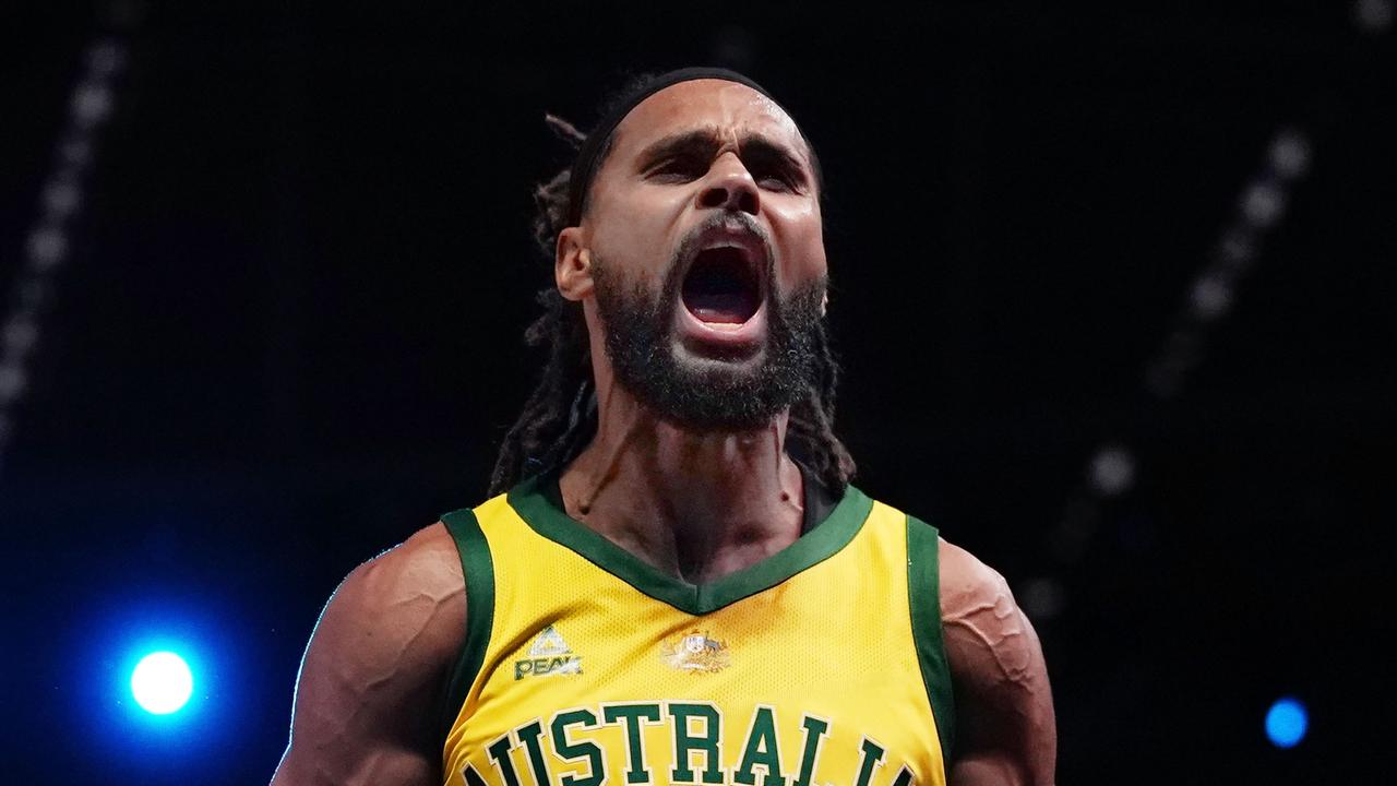 Patty Mills of Australia celebrates after making a basket in the final minutes during match 2 of the Pre-FIBA World Cup series between Australia and the USA at Marvel Stadium in Melbourne, Saturday, August 24, 2019. (AAP Image/Scott Barbour) NO ARCHIVING, EDITORIAL USE ONLY