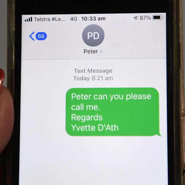 Queensland Health Minister Yvette D'Ath shows a text message she sent to Defence Minister Peter Dutton, asking him to call her. It later emerged she had the wrong number. Picture: NCA NewsWire / Dan Peled