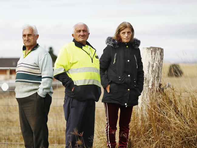 Joe Leonello (left), with his brother Andy Leonello and sister-in-law Grace Leonello pictured on their property in Luddenham. Picture: Sam Ruttyn