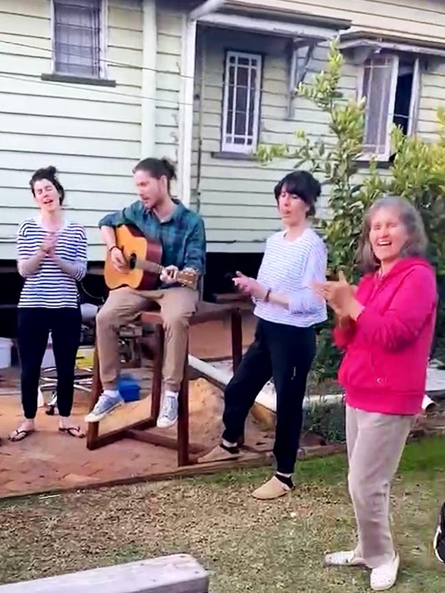 Group members singing.