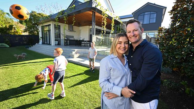 Tegun and Tim Geary at home with their children, Winnie, Henry and Boston. Picture: Lyndon Mechielsen