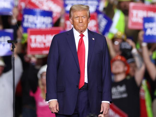 TOPSHOT - Former US President and Republican presidential candidate Donald Trump looks on during a campaign rally at PPG Paints Arena in Pittsburgh, Pennsylvania on November 4, 2024. (Photo by CHARLY TRIBALLEAU / AFP)