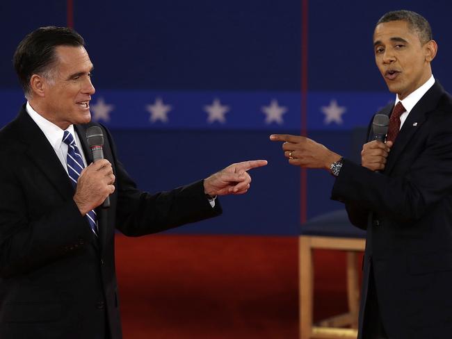 Political fight ... Republican presidential nominee Mitt Romney (left) lost to Democrat Barack Obama in 2012. Picture: AP Photo/Charlie Neibergall