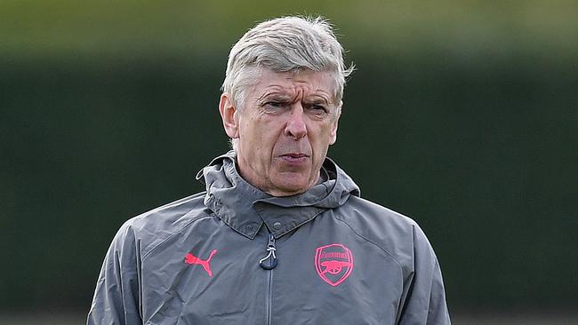 Arsenal's French manager Arsene Wenger attends a training session on the eve of their Europa League first leg semi-final