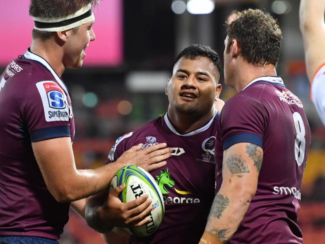 Reds prop Taniela Tupou celebrates scoring against the Blues. Picture: AAP