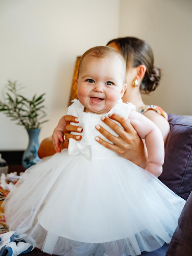 Amelia Surkitt. Nine months old. Amelia is the happiest baby on the face of the Earth. You’ll always see her with a little smile on her dial. Her favourite thing to do is sneak treats to her fur brothers Bentley and Chisel.
