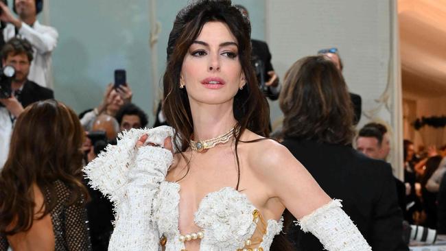 US actress Anne Hathaway arrives for the 2023 Met Gala at the Metropolitan Museum of Art on May 1, 2023, in New York. - The Gala raises money for the Metropolitan Museum of Art's Costume Institute. The Gala's 2023 theme is âKarl Lagerfeld: A Line of Beauty.â (Photo by ANGELA WEISS / AFP)