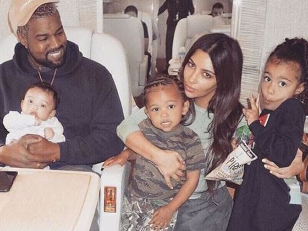 Kim Kardashian and Kanye West with three of their four children: Chicago, Saint and North.