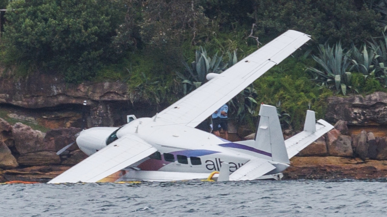 ‘A bumpy ride’ Seaplane crashes into Sydney Harbour after hitting a