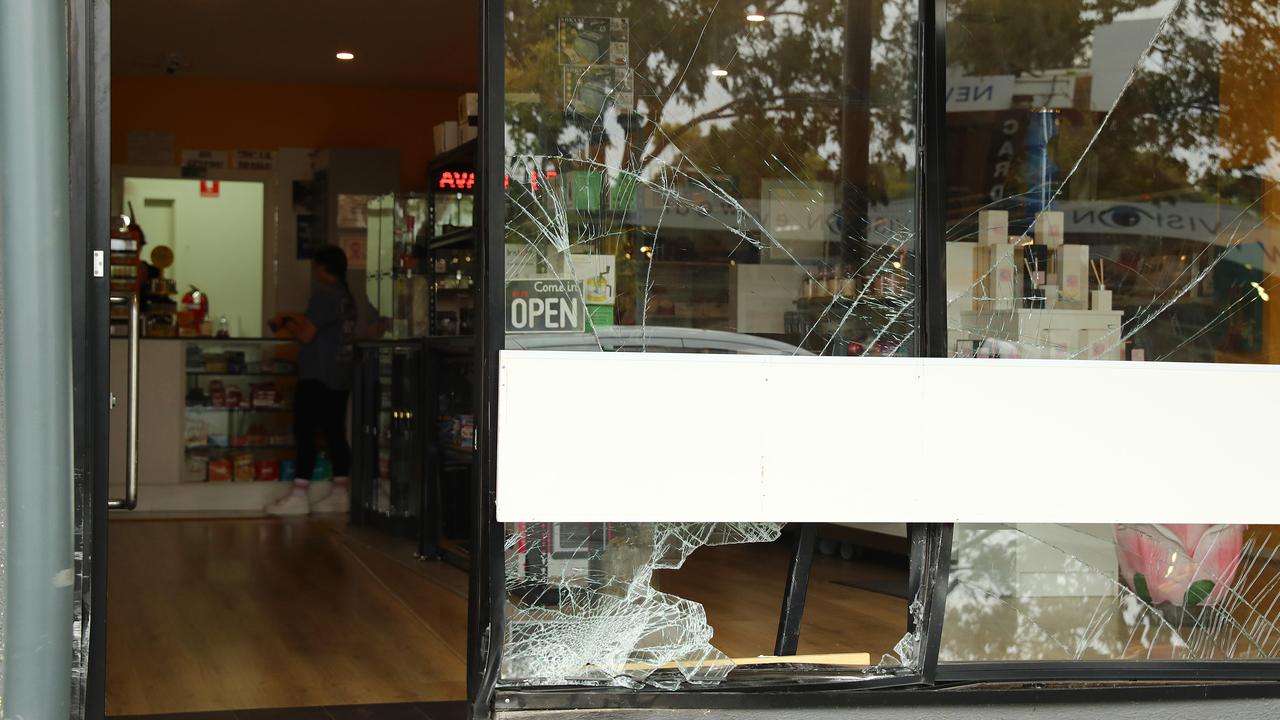 The store’s smashed window after it was ramraided. Picture: Alison Wynd