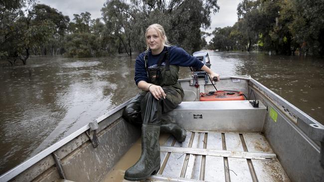 From gun metal to gumboots: Kiara Dean surveys her house. Picture: Arsineh Houspian.