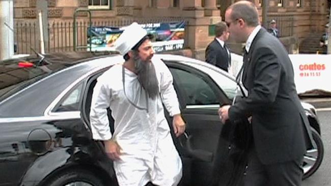 Security glitch: Licciardello dressed as Osama bin Laden, and Morrow during the APEC summit stunt.