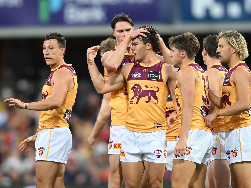 Cam Rayner gets the plaudits from his Brisbane teammates after booting a goal. Picture: Matt Roberts/AFL Photos/via Getty Images