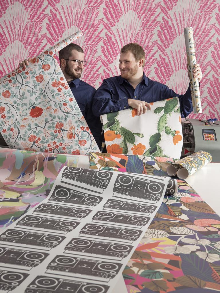 Milton and King Wallpaper and Fabric Co Toowoomba print operators Brodie Henry (left) and Benjamin Oberhardt. Picture: Nev Madsen