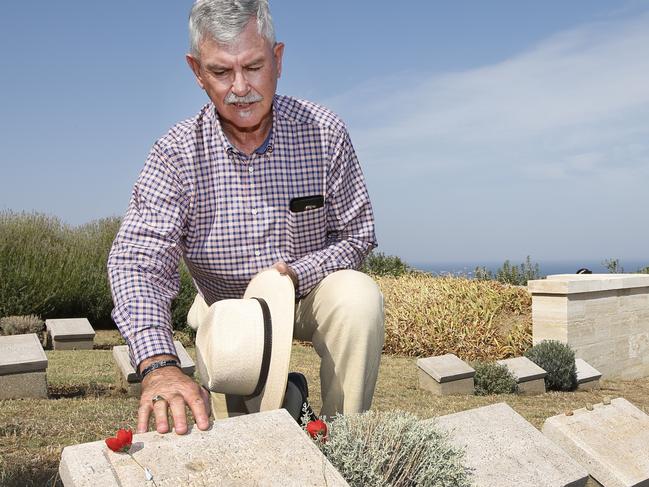 Centenary of the August 1915 at Lone Pine. Doug Baird father of Cameron Baird VC, follows in his late son's footsteps by visiting the headstone of Trooper Harold Rush who is quoted to say "Goodbye Cobber God Bless You" before being killed seconds later, at Walker's Ridge Cemetery. Picture: David Caird.