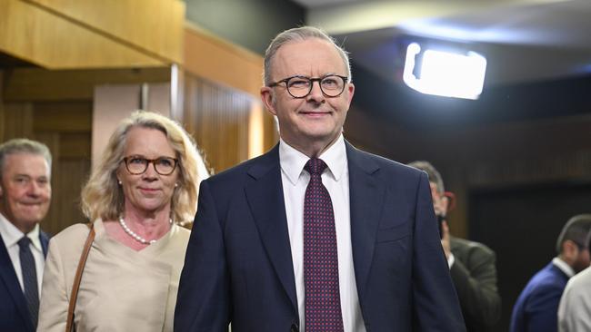 Anthony Albanese arrives for his National Press Club address in Canberra with the ABC’s Laura Tingle, the club president, behind. Picture: NewsWire / Martin Ollman