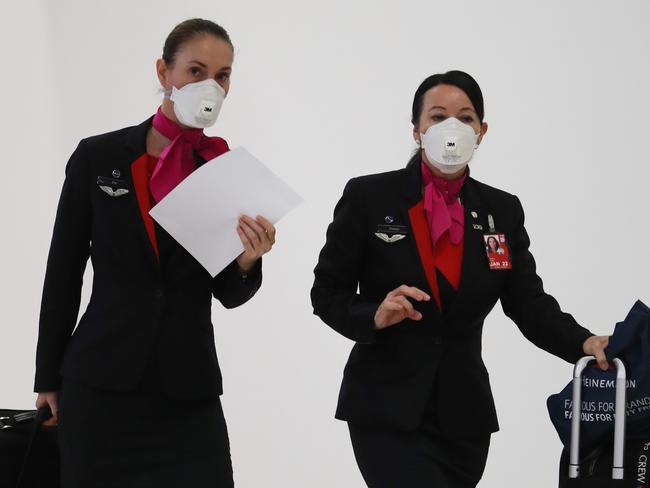 Aircrew are also obligated to wear masks, and take COVID-19 tests every week. Picture: John Grainger