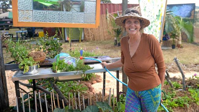 Proud mum Nicola Apps in her permaculture garden at son Leo's Tropical Bloom festival. Picture: Jann Houley
