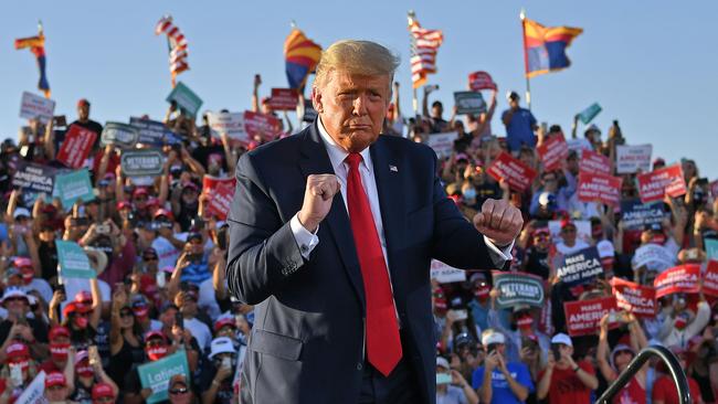 US President Donald Trump dances as he leaves a rally at Tucson, Arizona. Picture: AFP