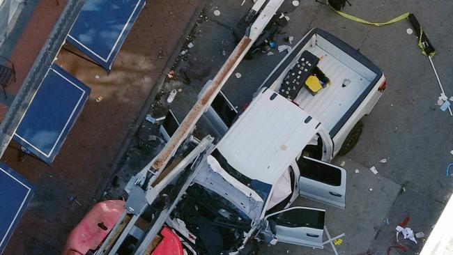 An Islamic State flag can be seen rolled up on the truck driven by the attacker. Picture: AP.