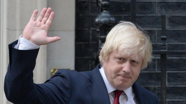 (FILES) In this file photo taken on July 13, 2016 Newly appointed Foreign Secretary Boris Johnson waves as he leaves 10 Downing Street in central Londonafter new British Prime Minister Theresa May took office.  British Foreign Secretary Boris Johnson has resigned, Downing Street said in a statement on July 9, 2018, hours after Brexit minister David Davis stepped down. / AFP PHOTO / OLI SCARFF