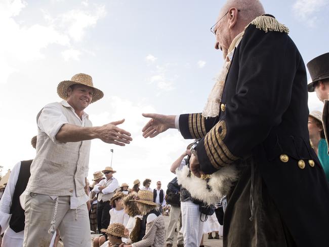 Aaron Graham is welcomed to Norfolk Island by David Buffet on Bounty Day. Picture: David Dare Parker