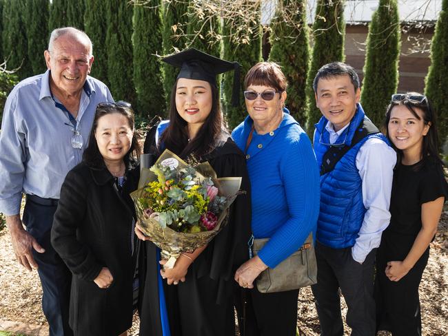 At a UniSQ graduation ceremony are (from left) Ross Marquard, Doris Liew, Rylie Pan graduating with a Bachelor of Science (Honours) (Environment &amp; Sustainability), Julka Marquard, Han Seng Pan and Penny Pan at Empire Theatres, Wednesday, June 28, 2023. Picture: Kevin Farmer