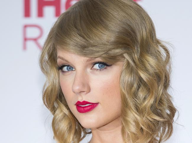 FILE - In this Sept. 19, 2014 file photo, Taylor Swift arrives at the iHeart Radio Music Festival in Las Vegas. Swift is releasing her fifth album, “1989,” on Monday, Oct. 27, 2014. It is the Grammy winner’s first full-length pop album and features the hit song, “Shake It Off.” (Photo by Andrew Estey/Invision/AP, File)