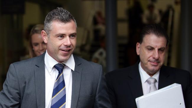 Ahmad’s lawyer, Michael Coroneos (right) leaves Waverley Local Court today. Picture: Craig Wilson