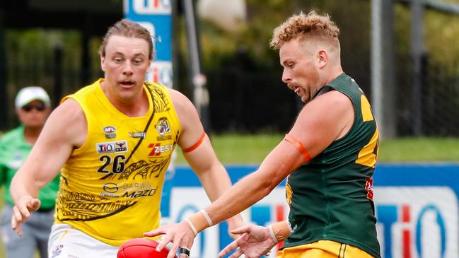 St Mary's spearhead Jackson Calder attempts to kick past Nightcliff's Mitch Norton in the 2023-24 NTFL season. Picture: Celina Whan / AFLNT Media