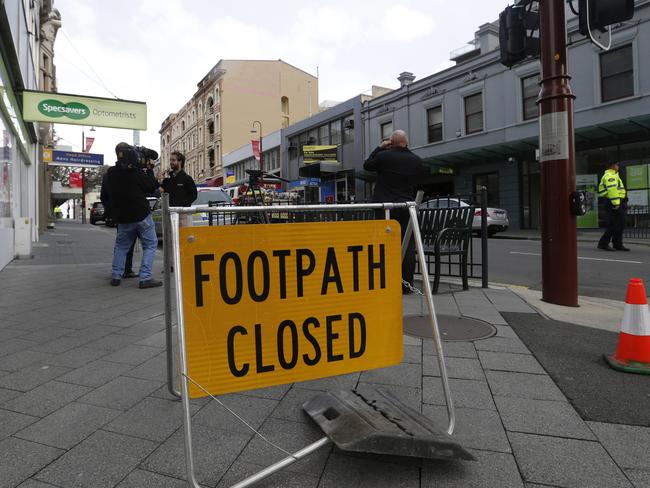 The footpaths in the section of Murray St outside Hadleys Hotel were closed as a precaution.