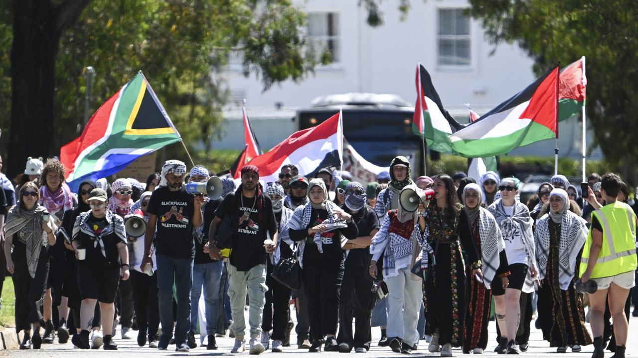 Palestine Action Group supporters march at Parliament House in Canberra. Picture: NCA NewsWire / Martin Ollman