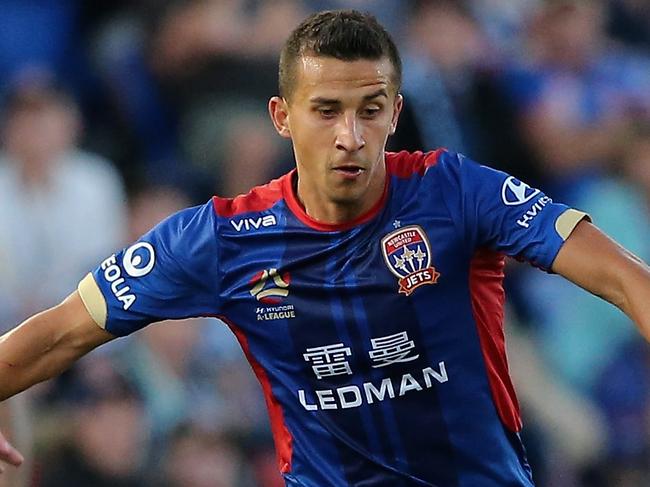 NEWCASTLE, AUSTRALIA - OCTOBER 15:  Daniel Georgievski of the Jets is contested by the Glory defence during the round two A-League match between the Newcastle Jets and Perth Glory at McDonald Jones Stadium on October 15, 2017 in Newcastle, Australia.  (Photo by Ashley Feder/Getty Images)