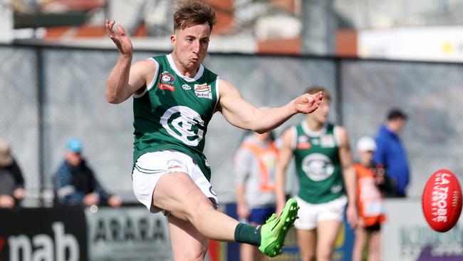 Jack Johnston gets a kick for Greensborough. Picture: George Sal