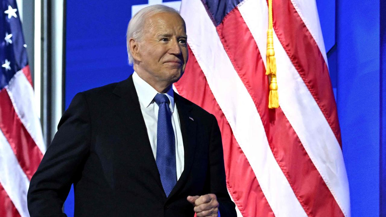 Joe Biden arrives on stage. Picture: AFP.