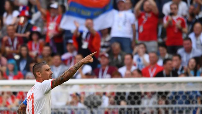 Aleksandar Kolarov celebrates after scoring his stunning free-kick.