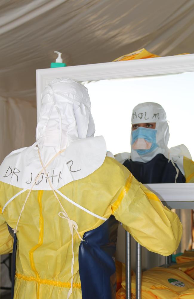 Dr John Gerrard in his Ebola protective equipment in Africa.