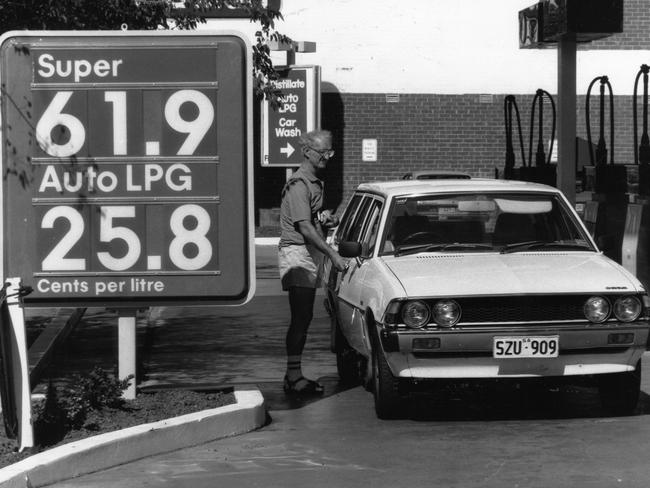 A motorist fills up, March 1990.