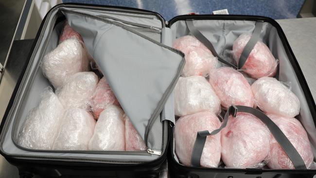 A US traveller has been charged after allegedly attempting to import more than 25kg of methamphetamine.