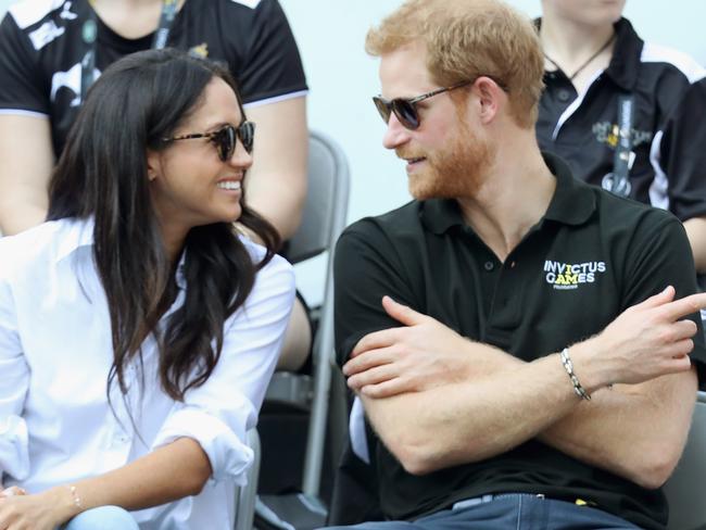 TORONTO, ON - SEPTEMBER 25:  Prince Harry (R) and Meghan Markle (L) attend a Wheelchair Tennis match during the Invictus Games 2017 at Nathan Philips Square on September 25, 2017 in Toronto, Canada  (Photo by Chris Jackson/Getty Images for the Invictus Games Foundation )