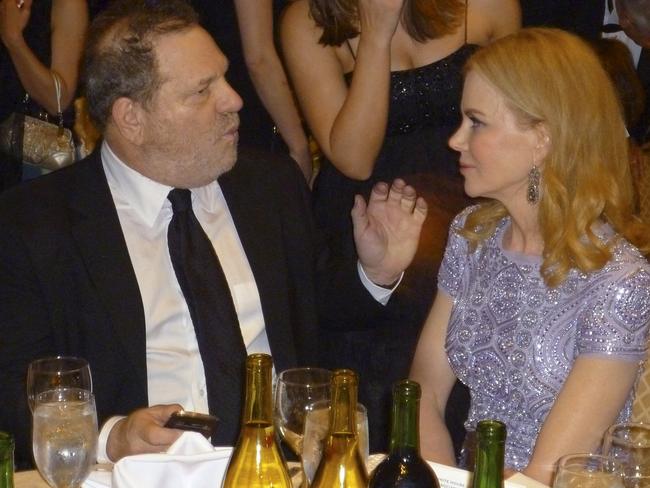 Harvey Weinstein (left) talks to actress Nicole Kidman at the annual White House Correspondents Association dinner in 2013. Picture: Reuters/Jim Bourg