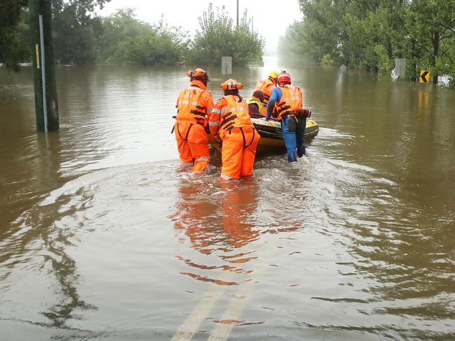 SYDNEY, AUSTRALIA - MARCH 23: State Emergency Service workers launch their rescue craft into the flooded Hawkesbury river along Inalls lane in Richmond on March 23, 2021 in Sydney, Australia. Evacuation warnings are in place for parts of Western Sydney as floodwaters continue to rise. (Photo by Mark Kolbe/Getty Images)