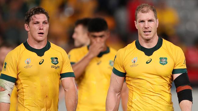 CHOFU, JAPAN - SEPTEMBER 29: Michael Hooper and David Pocock of Australia and teammates walk off the pitch at full-time following defeat in the Rugby World Cup 2019 Group D game between Australia and Wales at Tokyo Stadium on September 29, 2019 in Chofu, Tokyo, Japan. (Photo by Dan Mullan/Getty Images)