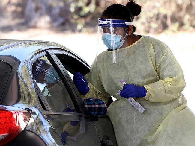 Masks are mandatory and anyone who has been to an exposure site should get tested. Picture: Paul Kane/Getty Images