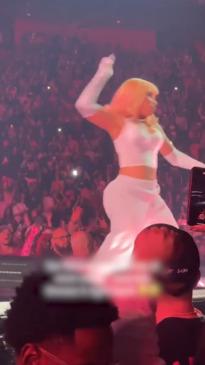 Nicki Minaj throws object at fan